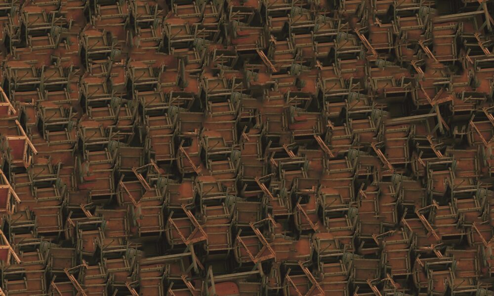 Cadeiras escolares empilhadas e abandonadas ilustram a substituição da educação tradicional pela inteligência artificial, evidenciando a lacuna no letramento digital.