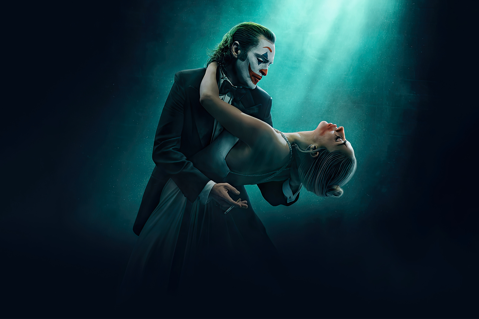 Cartaz do filme Joker: Folie à Deux, lançado em outubro de 2024, com Joaquin Phoenix e Lady Gaga. A imagem mostra os dois personagens em uma dança sob uma luz suave, com um fundo escuro e misterioso.